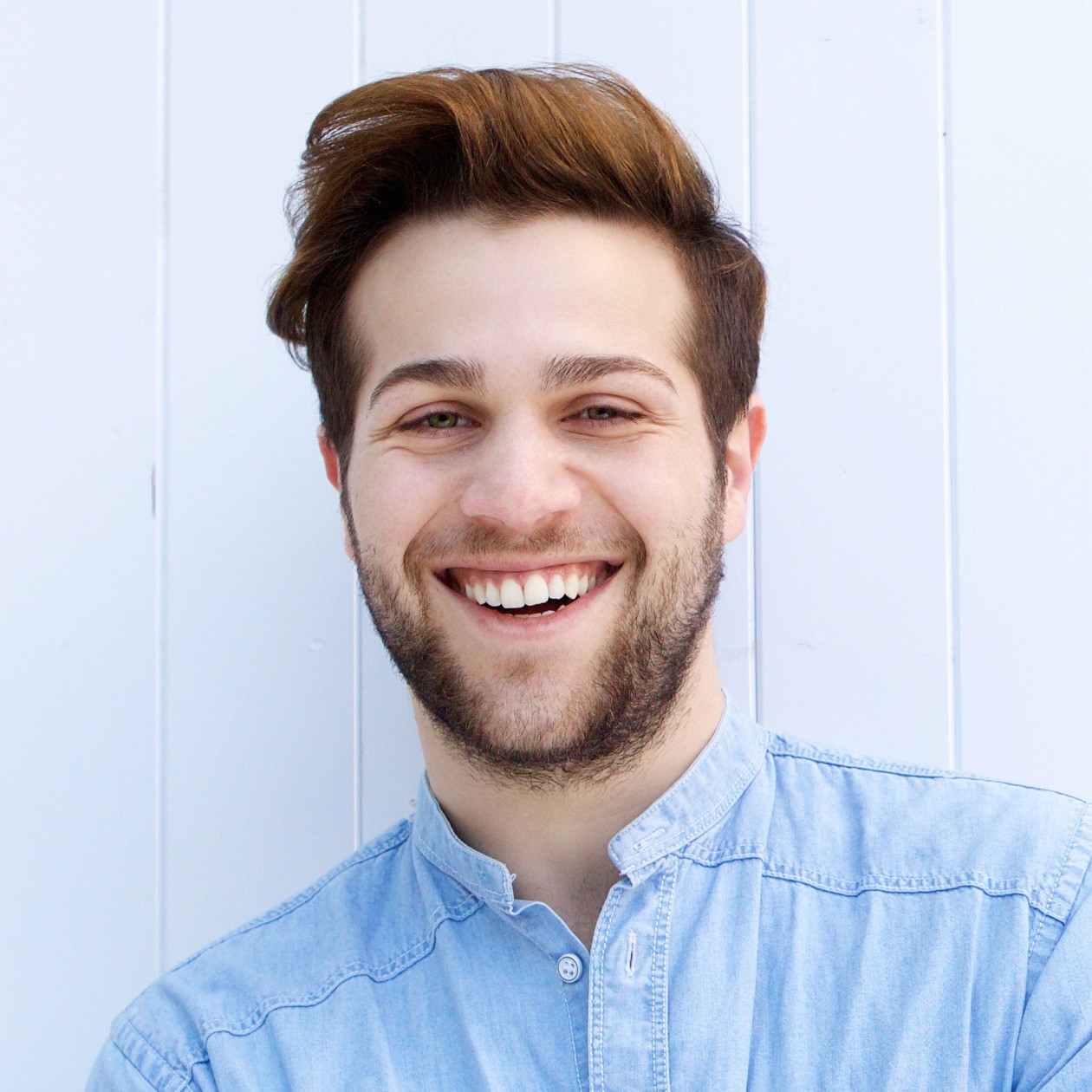 Testimonials Attractive Young Man Smiling With Arms Crossed PF8HN7L 1 1
